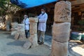 Palestinian cleans artifacts at the museum, while the Ministry of Tourism announced the closure of tourist places due to the outbr