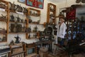 Palestinian cleans artifacts at the museum, while the Ministry of Tourism announced the closure of tourist places due to the outbr