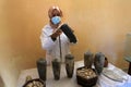 Palestinian cleans artifacts at the museum, while the Ministry of Tourism announced the closure of tourist places due to the outbr