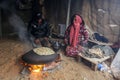 Palestinian family inside their home after heavy rain in a poor neighborhood