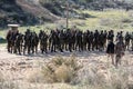 Palestinian fighters take part during a military drill carried by armed groups