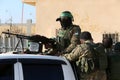 Palestinian fighters take part during a military drill carried by armed groups