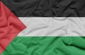 Palestinian Flag with Vibrant Colors and Fabric Background