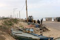 Palestinian maintenance teams work to repair damage due to rainstorms in the `Swedish village`