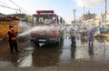 Palestinian municipality and civil defense employees organize a street cleaning and sterilization campaign in light of the coronav