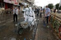 Palestinian municipality and civil defense employees organize a street cleaning and sterilization campaign in light of the coronav