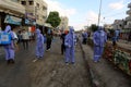 Palestinian municipality and civil defense employees organize a street cleaning and sterilization campaign in light of the coronav