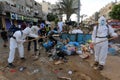 Palestinian municipality and civil defense employees organize a street cleaning and sterilization campaign in light of the coronav