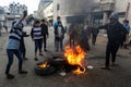 Palestinian students take part in a protest against the U.S. President Donald Trump`s Middle East peace plan