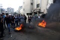 Palestinian students take part in a protest against the U.S. President Donald Trump`s Middle East peace plan