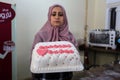 Palestinian women make sweets and traditional cakes in preparation for the blessed Eid Al-Adha feast