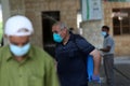 A Palestinian worker wearing a protective face mask sanitises a classroom in school a before a new academic year starts, amid conc