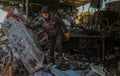 Palestinian workers collect solid waste `scrap` for export to Israel through the Karem Abu Salem crossing