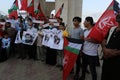 Palestinians, carry placards demanding the release of administrative detainee in Israeli custody Maher al-Akhras