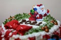 Palestinians chef create New Year and Christmas-styled festive cakes at a bakery