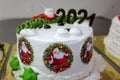 Palestinians chef create New Year and Christmas-styled festive cakes at a bakery