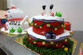 Palestinians chef create New Year and Christmas-styled festive cakes at a bakery