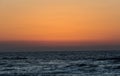 Palestinians enjoy themselves on the beach during sunset, in Gaza Strip