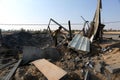 Palestinians inspect a seaport after an Israeli airstrike in the southern Gaza Strip