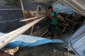 Palestinians inspect a seaport after an Israeli airstrike in the southern Gaza Strip