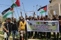 Palestinians participate in a march rejecting the policy of the Israeli annexation project in the West Bank and the Jordan Valley