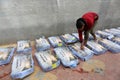 Palestinians prepare smoked fish `ranga` and sell it in the market in preparation for Eid Al-Fitr Day