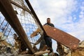 Palestinians salvage belongings from the site of an Israeli airstrike