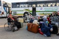 Palestinians wait to cross over to the Egyptian side of the Rafah border crossing