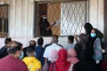 Palestinians wait to cross over to the Egyptian side of the Rafah border crossing