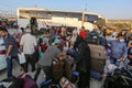 Palestinians wait to cross over to the Egyptian side of the Rafah border crossing