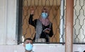 Palestinians wait to cross over to the Egyptian side of the Rafah border crossing