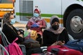 Palestinians wait to cross over to the Egyptian side of the Rafah border crossing