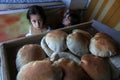 Palestinians working in a small bakery supported by a European charity Royalty Free Stock Photo