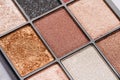 Palette of colorful eye shadows close up