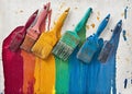 The palette of colorful rainbow brushes with paint