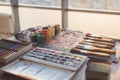 Palette with oil paints and gouache set. Clean painter workplace ready for drawing. Royalty Free Stock Photo