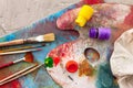 palette with paints and brushes for painting