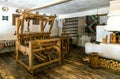 Antique wooden loom in the village weaver`s house. Housing and workshop Royalty Free Stock Photo