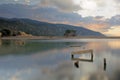 Palinuro. Mingardo river mouth at dawn with cloudy sky