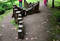 A palisade of hollowed-out wooden logs serves as an obstacle course up and down. training stability. gutters made of wood, for wat Royalty Free Stock Photo