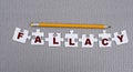 PALLACY is a word made up of paper white puzzles on a gray background and in pencil