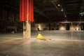 Pallet jack sits in empty convention hall Royalty Free Stock Photo