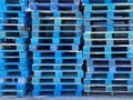 pallet shipping receiving wood stacked palates trucking logistics wooden generic strong support rack warehouse painted blue cargo