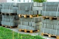 Pallets with concrete curbs on the construction site. Repair of the sidewalk Royalty Free Stock Photo