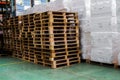 The pallets inside warehouse for support packing