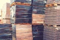 Pallets with red bricks outdoors. Building materials wholesale. pallets and packages of freshly produced red bricks in a