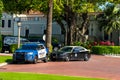 Palm Beach police department and Florida State Trooper cars provide security at the Royal Poinciana Way, Palm Beach, Florida Royalty Free Stock Photo