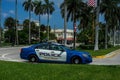 Palm Beach police department car provides security at the Royal Poinciana Way, Palm Beach, Florida Royalty Free Stock Photo