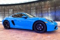 Palm Beach, Florida USA - March 22, 2021: bright blue Porsche 718 Cayman. side view.