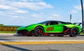 Palm Beach, Florida USA - March 21, 2021: green Lamborghini Aventador car on road in palm beach Royalty Free Stock Photo